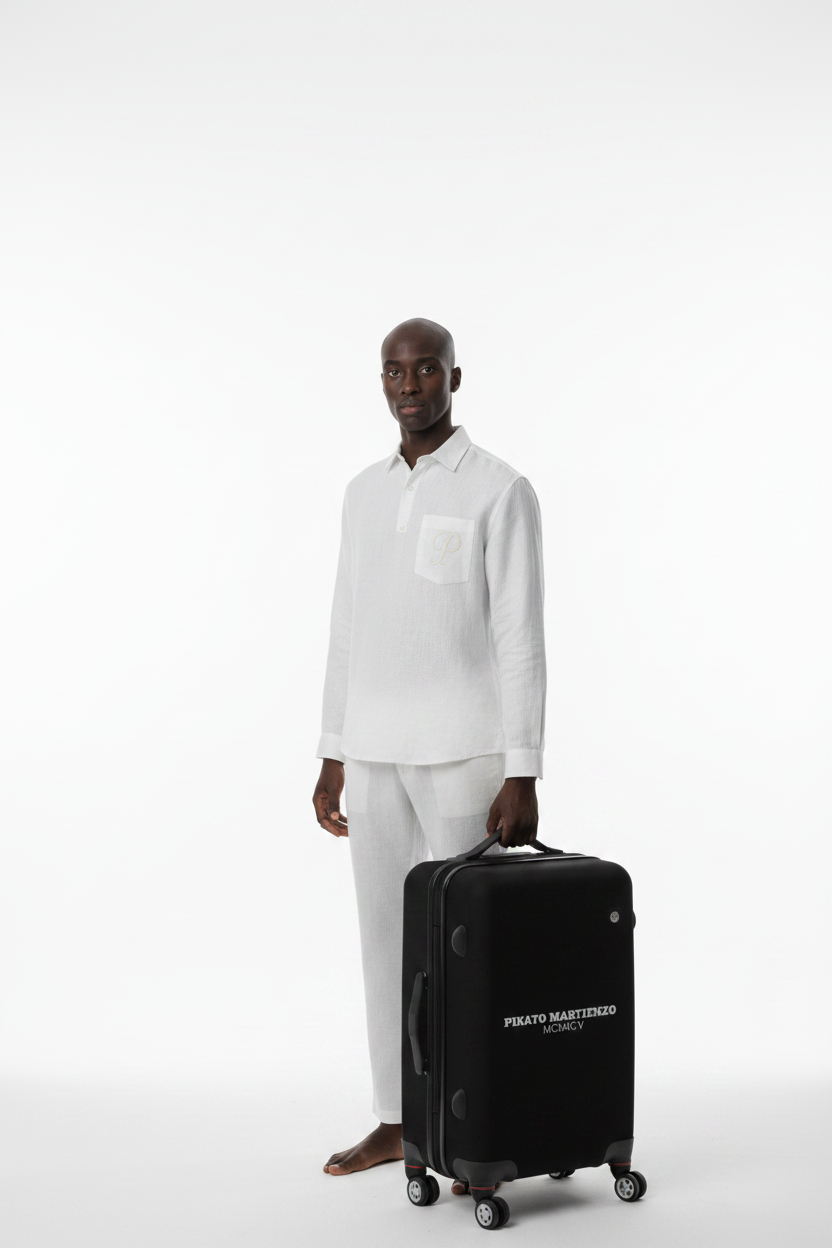 A black hard-shell suitcase with a black compression sleeve featuring the white text 'PIKATO MARTIENZO' and 'MCMXCV', shown on a plain white background.
